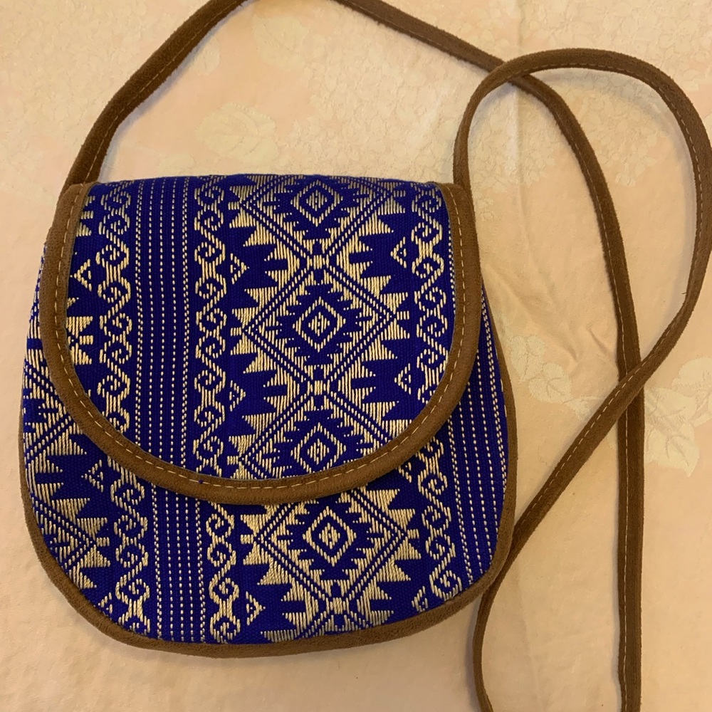 Medium size boho style crossbody bag, tags removed but never used
